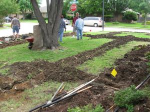 a new sprinkler line installation in progress